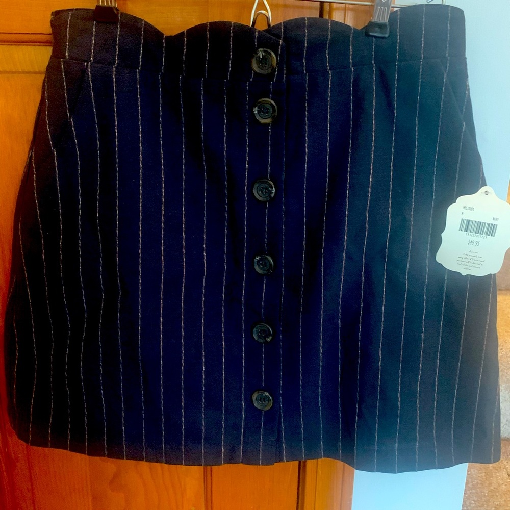Altar’d State Navy skirt with tags. Never worn.